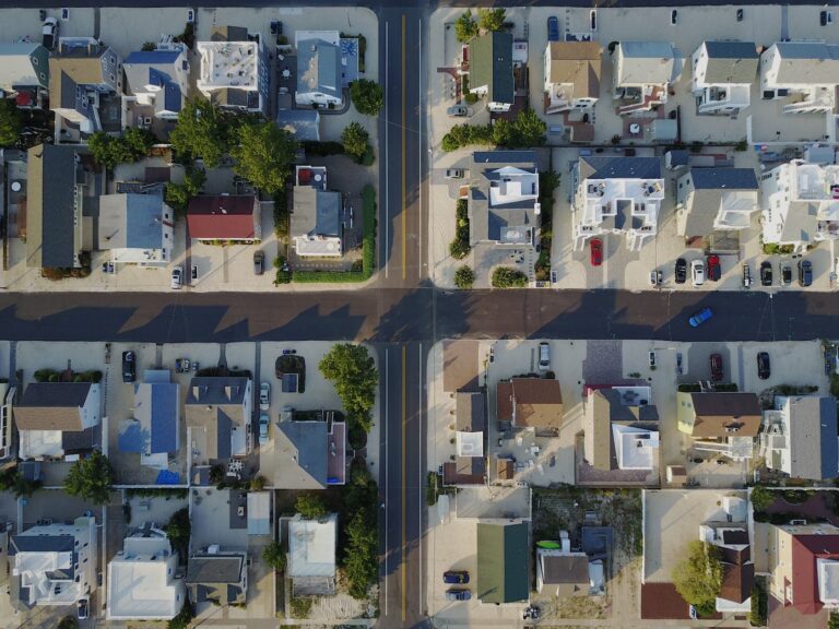 Aerial drone view of a Houston-area residential neighborhood with single-family homes.